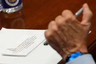 A statement note on a table in front of Dr Anthony Fauci on Wednesday. Photo: Reuters