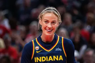 Fan hold a Indiana Fever guard Sophie Cunningham (8) (not pictured) sign during the first half between the Seattle Storm and the Indiana Fever