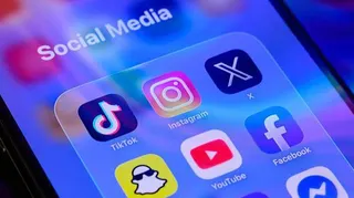 The app symbols for Snapchat, YouTube, Facebook, TikTok, Instagram and X are displayed on a smartphone screen, under the label Social Media.