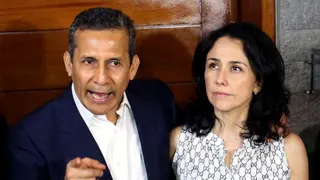 Ollanta Humala stands next to his wife Nadine Heredia