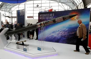 A man looks at a Patriot Advanced Capability (PAC-3) Missile Segment Enhancement model by Lockheed Martin at an international military fair in Kielce, Poland, in September 2017. Photo: Reuters
