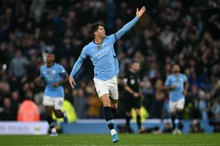 John Stones (centre) leaves Manchester City for Inter Milan on a free transfer. — AFP pic