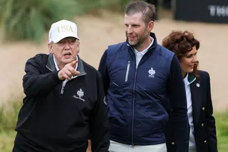 BALMEDIE, SCOTLAND - JULY 29: U.S. President Donald Trump cuts the ribbon next to Eric Trump (2nd R) and Sarah Malone, Executive Vice President and general manager of Trump international Golf Links Scotland (R) at the ribbon-cutting ceremony at a new 18-hole course at Trump International Golf Links on July 29, 2025 in Balmedie, near Aberdeen, Scotland. President Trump is visiting Scotland in a trip that’s part-vacation, part-work, as he stayed at his Trump Turnberry golf course, followed by Trum