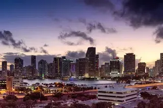 A rush of wealthy newcomers seeking lower taxes has been raising the ceiling on high-end real estate in Miami, which has recently been outpacing traditionally pricier markets in ultra-luxury sales.