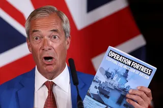 Britain’s Reform UK leader Nigel Farage holds a booklet that reads “Operation Fortress, Stopping the Invasion of Britain” on Monday. Photo: Reuters