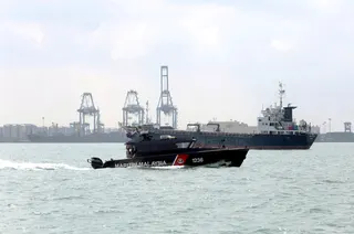Malaysian Maritime Enforcement Agency (APMM) personnel aboard a boat conducting a patrol at North Port, Port Klang. NSTP FILE PIC