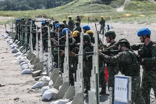 Taiwan military personnel conduct a live-fire exercise on Zhongfu Beach as part of annual Han Kuang military exercise in New Taipei City on August 5. — AFP pic