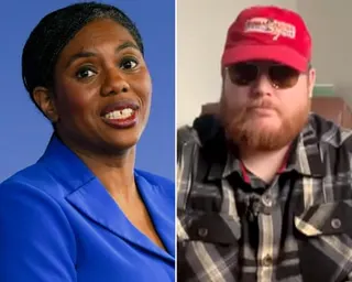 Kemi Badenoch smiling in a blue blazer beside Joshua Bonehill-Paine in sunglasses and a red cap