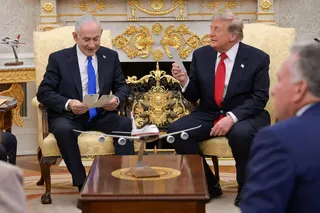 Israel’s Prime Minister Benjamin Netanyahu meets with US President Donald Trump in the Oval Office of the White House on July 28. Photo: AFP/GPO/Handout