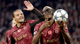Galatasaray's Leroy Sane (left) and Victor Osimhen (right) celebrate the latter's goal against Ajax in the Champions League
