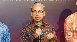 Communications Minister Datuk Seri Fahmi Fadzil speaking at the at the launch of U Mobile Enterprise Innovation Platform Hub. NSTP/ AHMAD UKASYAH