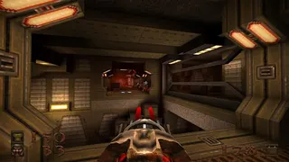 The player aims a Laser Cannon down a futuristic corridor.