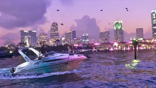 Official GTA 6 image showing a boat on the water, with Vice City behind, all of it lit in pink-purple hue