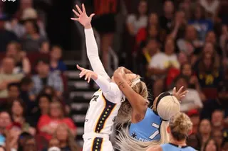 Indiana’s Sophie Cunningham is fouled by Chicago’s DiJonai Carrington during the first half of Saturday’s game at the United Center in Chicago.