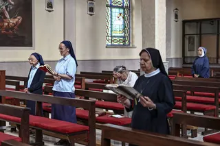 Catholic nuns and Christian worshippers attend mass at the Latin Monastery (Deir al-Latin) in the Palestinian Christian town of Taybeh in the Israeli-occupied West Bank. Photo: AFP