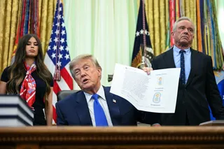 US Secretary of Health and Human Services Robert F. Kennedy Jnr (right) and US President Donald Trump with an executive order calling for more research and flexibility on vaccines, in the Oval Office of the White House in Washington on Monday. Photo: AFP via Getty Images / TNS