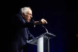 a man speaks in to a microphone