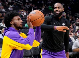 NBA球星詹姆斯他與兒子曾都同時為位湖人隊效力。（路透）