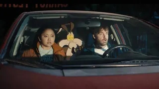 Coyote in a car with Will Forte and Lana Condor in Coyote vs. Acme