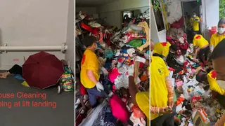 屋内杂物堆积 妇女露宿电梯口四年