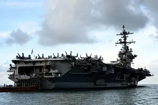 The USS George Washington aircraft carrier arrives in Da Nang, Vietnam, in July. Photo: AFP