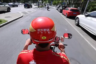 The results underscore the impact of JD.com’s expansion into food delivery, logistics and international operations over the past year. Photo: Xinhua
