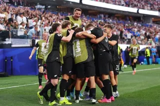 New Zealand celebrate a goal against Iran at the World Cup