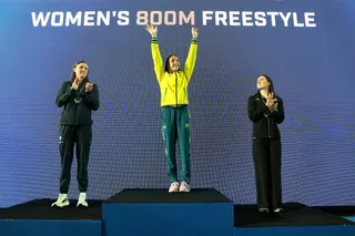 IRVINE, CALIFORNIA - AUGUST 15: (L-R) Katie Ledeky of Team United States second place, Lani Pallister of Team Australia first place and Erika Fairweather of Team New Zealand look on from the podium for the Women's 800m Freestyle Final on Day 4 of the Pan Pacific Swimming Championships at William Woollett, Jr. Aquatics Center on August 15, 2026 in Irvine, California. Sean M. Haffey/Getty Images/AFP (Photo by Sean M. Haffey / GETTY IMAGES NORTH AMERICA / Getty Images via AFP)