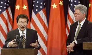 Zhu Rongji (left) answers questions as China’s premier during a joint press conference with then-US President Bill Clinton in Washington, DC, on April 8, 1999. The Chinese statesman died on August 12, 2026 at age 97. — AFP file pic