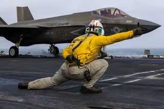 A US sailor launches an F-35C Lightning II from the USS Abraham Lincoln’s flight deck. Photo:  US Navy/Reuters