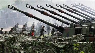 China seeks political settlement of Korean Peninsula as Trump orders reduced drills with Seoul