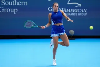 Sabalenka returns a shot against Gibson in their second-round clash
