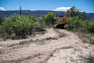Heavy machinery is seen inside Big Bend National Park in southern Texas, on August 15, 2026. US President Donald Trump's administration plans to build a section of the border wall inside the national park. (Photo by RONALDO SCHEMIDT / AFP)