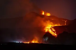 a volcano erupts