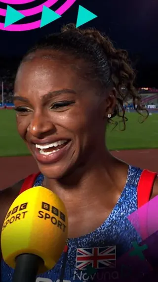 Dina Asher-Smith laughs during her post-race interview