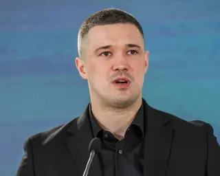 Ukraine's Defence Minister Mykhailo Fedorov speaks into a microphone at a press conference