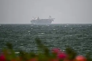 A vessel is seen off the coast of Sharjah in the United Arab Emirates on August 3. Photo: AFP