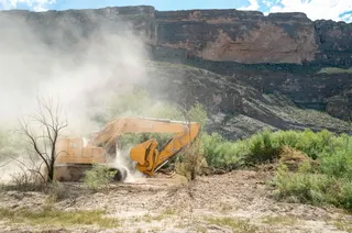 A bulldozer clears land for a section of border wall near Santa Elena Canyon in Big Bend National Park, Texas, on August 14, 2026. The Trump administration has since paused construction on the controversial project following bipartisan opposition. — Getty Images pic via AFP