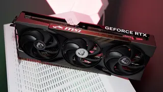 An MSI RTX 5060 Ti on top of a PC case and with the rear backplate removed.