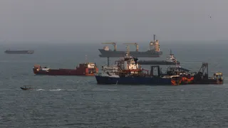 Ships are anchored in the Strait of Hormuz