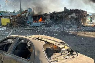 A building burns after Russian drone strikes in Pechenihy, in the Kharkiv region of northeast Ukraine, on Tuesday. Photo: Press service of the State Emergency Service of Ukraine in Kharkiv region/Handout via Reuters