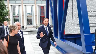 Crown Prince Haakon of Norway gestures to a crowd. Photo: July 2026