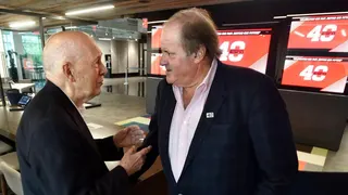 Bill Rasmussen speaks with Chris Berman at ESPN's 40th anniversary celebration.