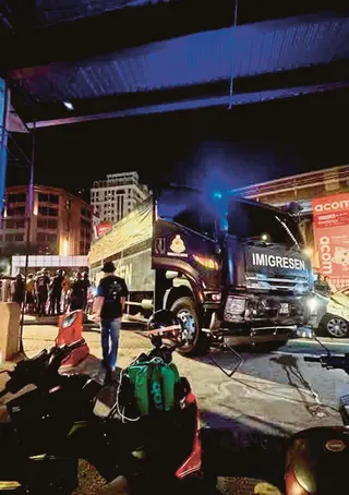 The drivers of a Proton Saga and an Immigration Department lorry were remanded for a day to facilitate investigations into the collision that killed a father and his two daughters. SOURCE: SOCIAL MEDIA