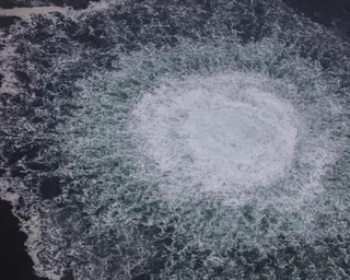 Aerial view of gas leaking from the Nord Stream pipeline, causing foam to swirl on the sea