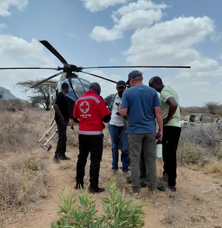 Rescue officials work at the site of a tourist helicopter crash that caused multiple casualties, according to police, in Samburu County, Kenya, on Wednesday. Photo: Kenya Red Cross/Handout via Reuters