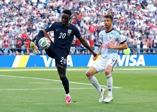 A reinstated Folarin Balogun of the US (left) in action against Belgium’s Brandon Mechele during their round-of-16 match on July 6 - which Belgium went on to win.