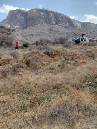 Rescuers work at the site of a tourist helicopter crash in Samburu county, Kenya, on Wednesday. Photo: Kenya Red Cross/Handout via Reuters