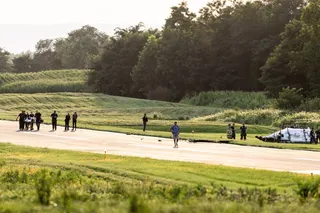 Authorities investigate a crash between a state police helicopter and a small plane at the Carlisle airport in Pennsylvania, the US on Wednesday. Photo: via AP
