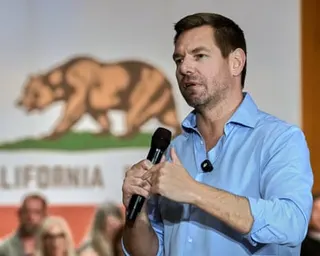 a man speaks into a microphone